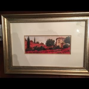 This is a Guido Borelli print in a wood frame